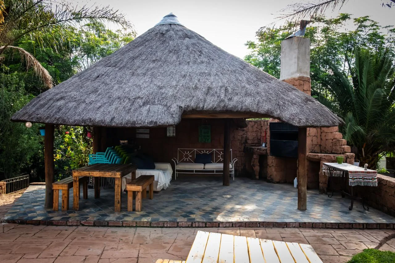 Outdoor lapa and entertainment area at On The Mend halfway house, Waterkloof Ridge
